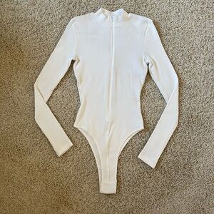 Fashion Nova White Long Sleeve Zip Up Bodysuit